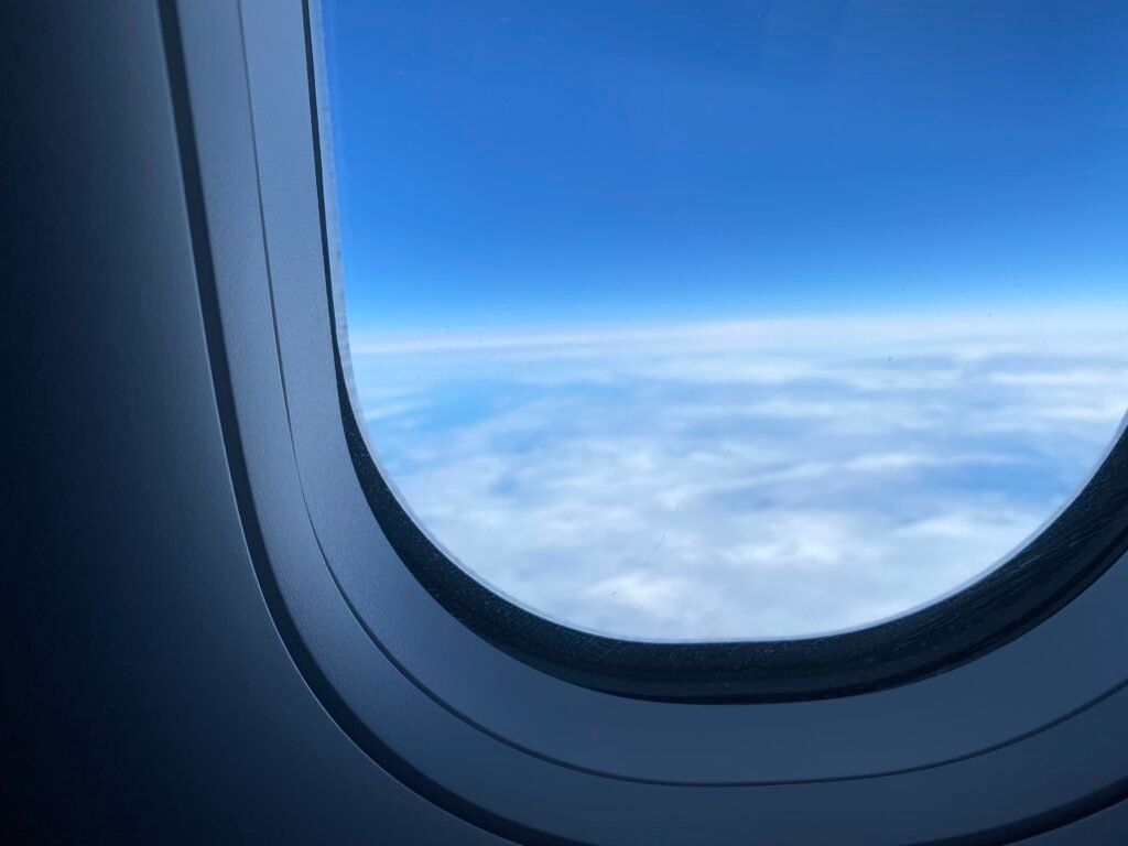 Looking out the window on an airplane